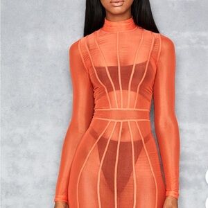 Mistress rocks sheer orange dress